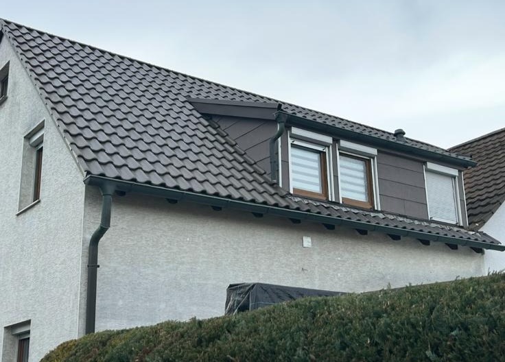 Aufnahme zu Dacharbeiten und Gebäuden